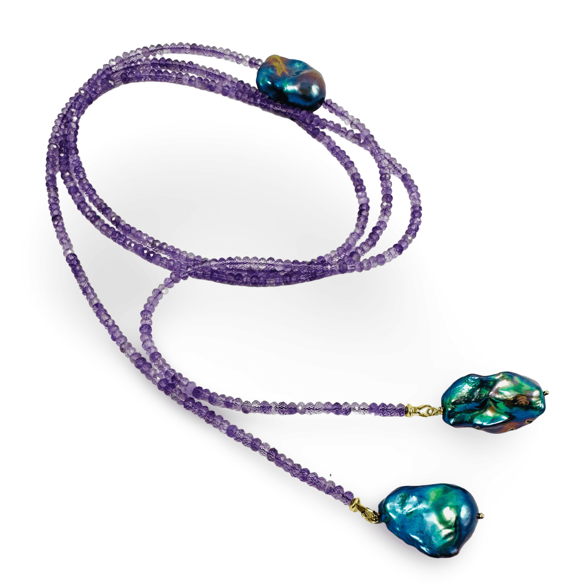 A beaded necklace featuring a long strand of purple faceted beads with two drop ends, each terminating in an irregular, iridescent blue-green baroque pearl. The necklace is displayed on a clean white background.