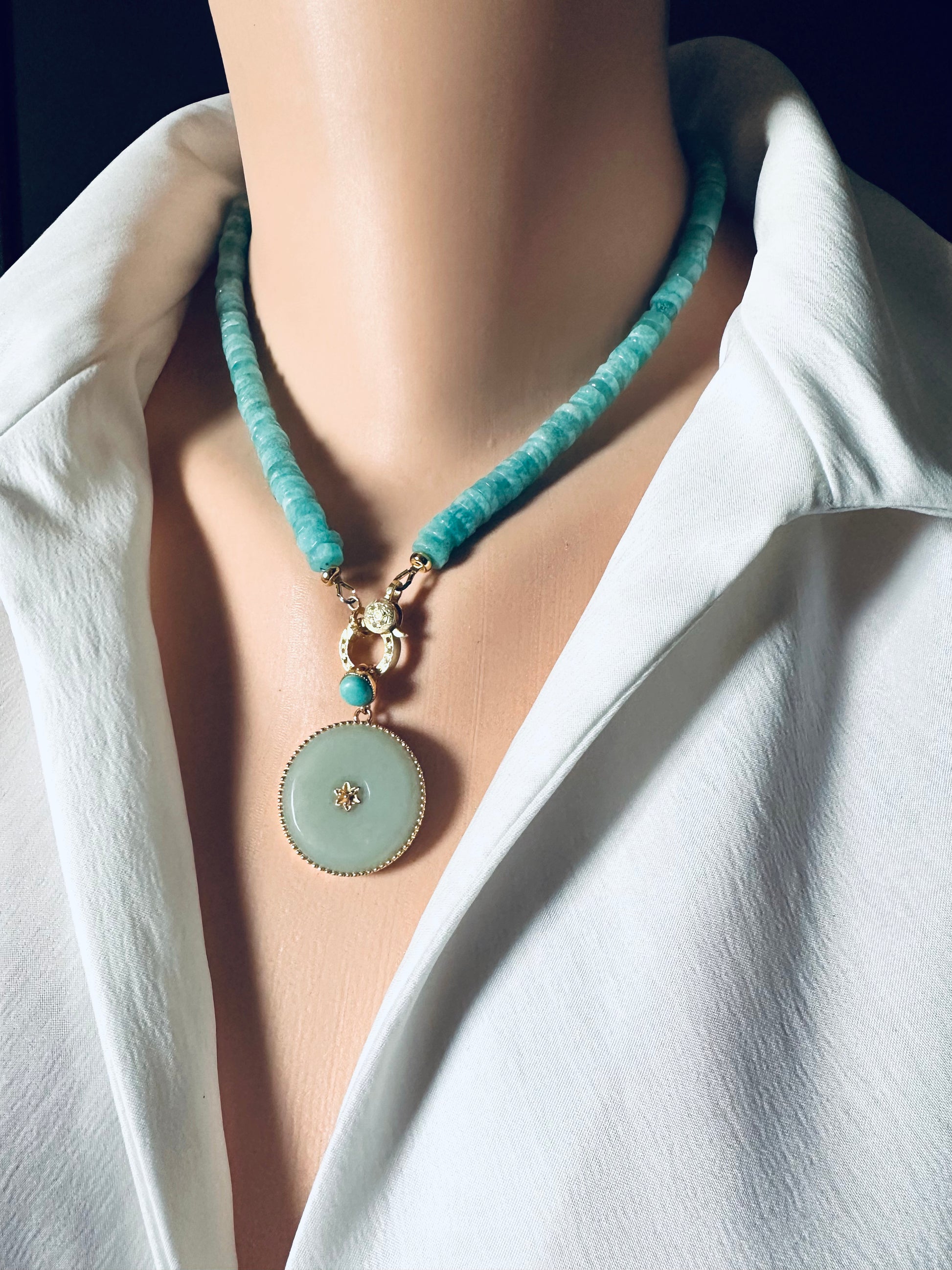 AMAZONITE necklace with a pendant on a mannequin wearing a white shirt.
