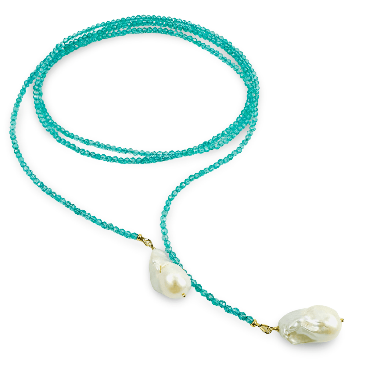 A long-strand teal blue apatite beaded necklace with two large, irregular white baroque pearls suspended from gold-toned rings, displayed on a clean white background.