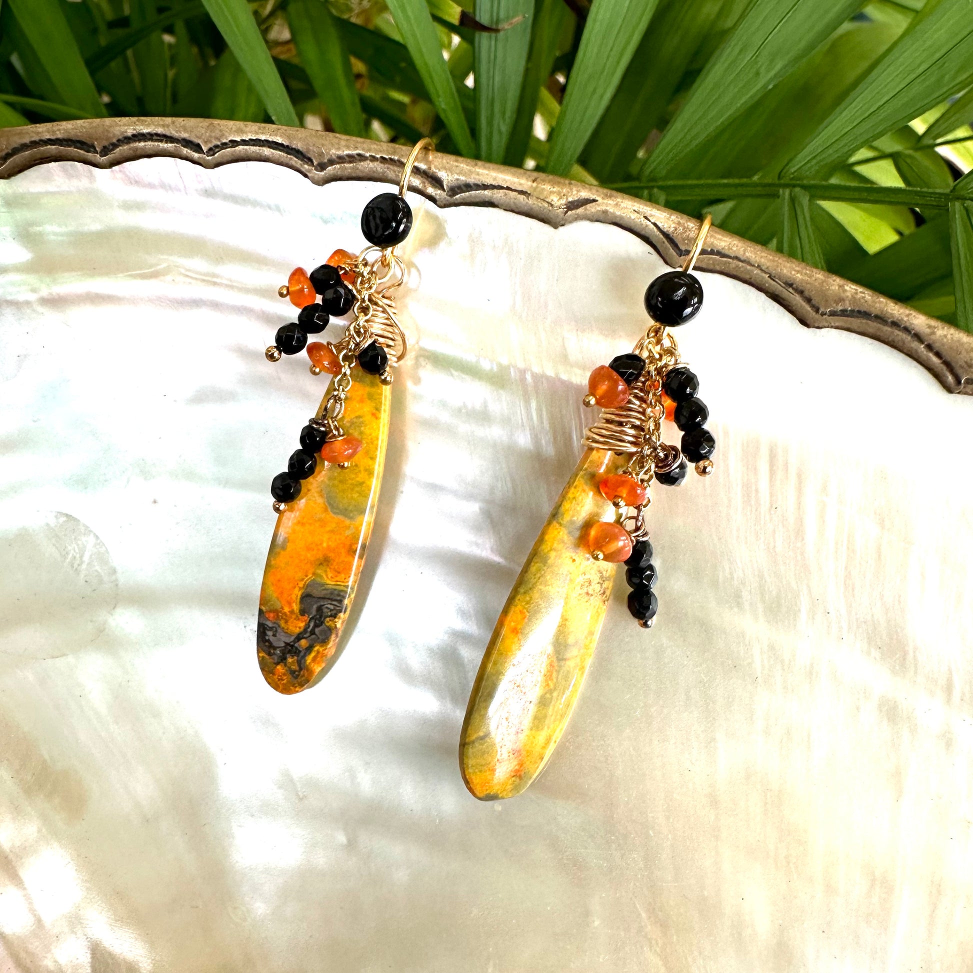 Bumble Bee Jasper earrings with carnelian and onyx clusters showcasing vibrant yellow, orange, and black patterns.