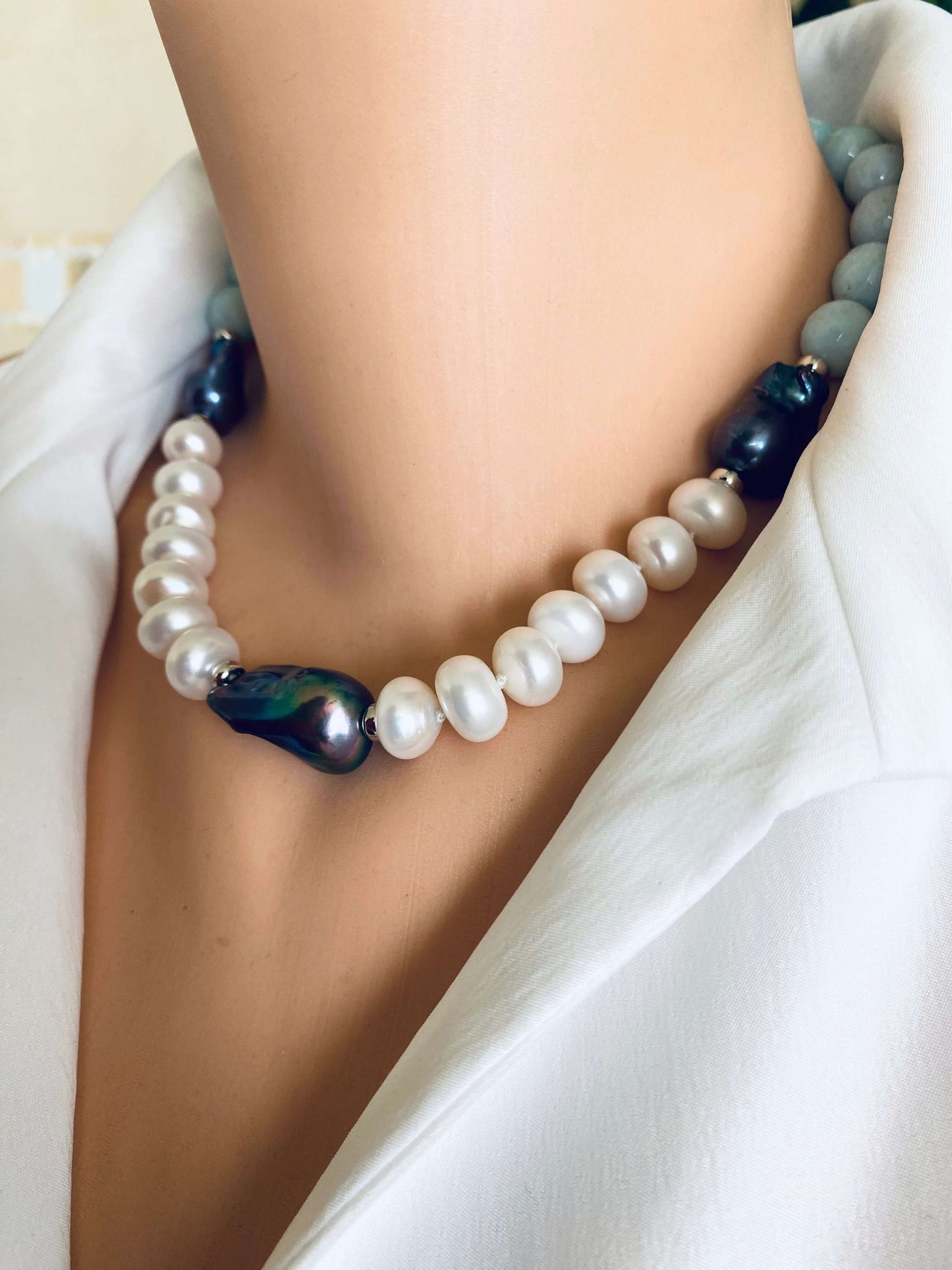 Amazonite pearl necklace featuring baroque and coin pearls, highlighting vivid colors and elegant design.