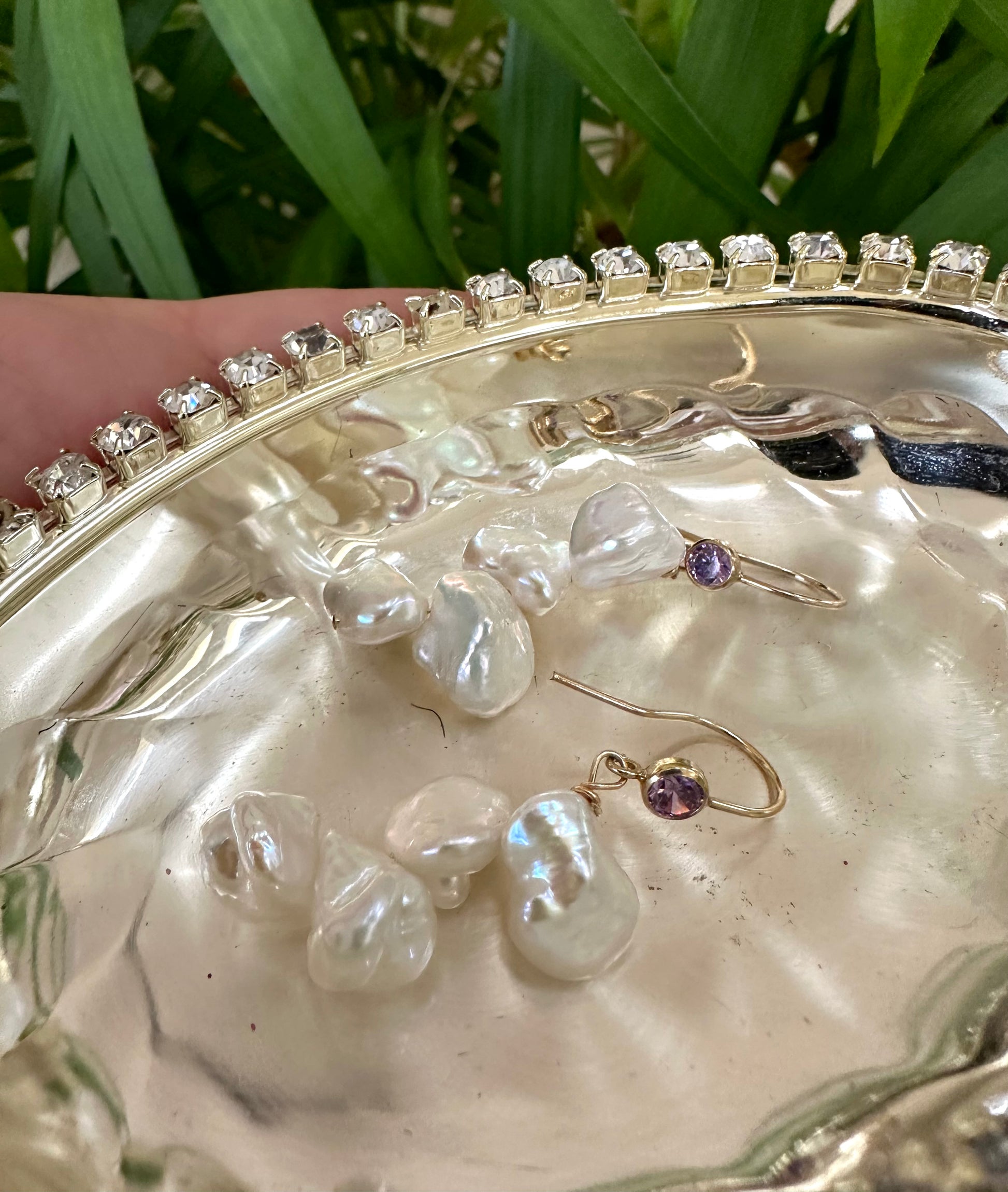 Keshi Pearl Drop Earrings – 14k Gold Filled with Purple CZ displayed on a silver platter, highlighting unique baroque pearls.