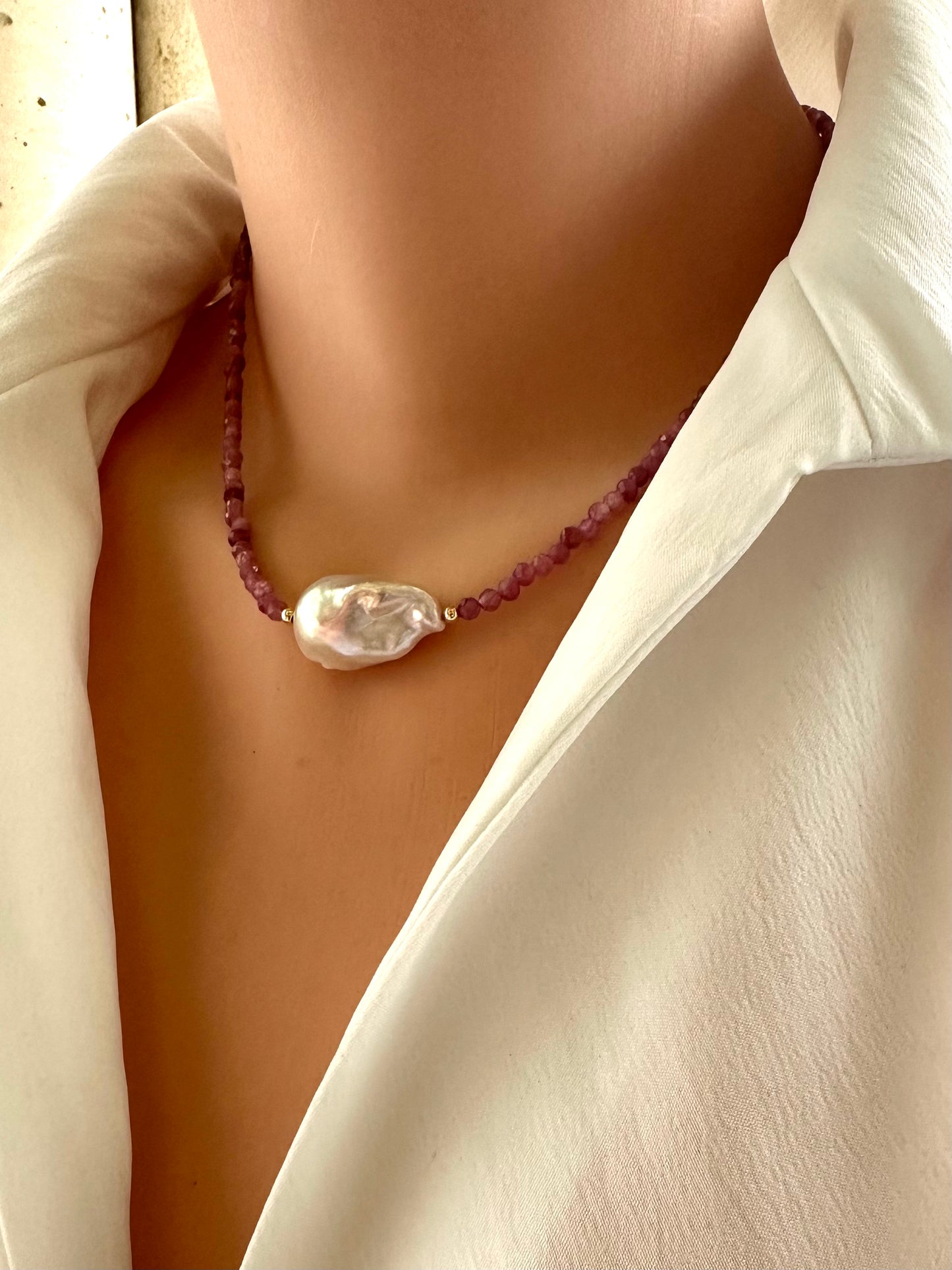 pink tourmaline baroque pearl necklace close up on mannequin side view