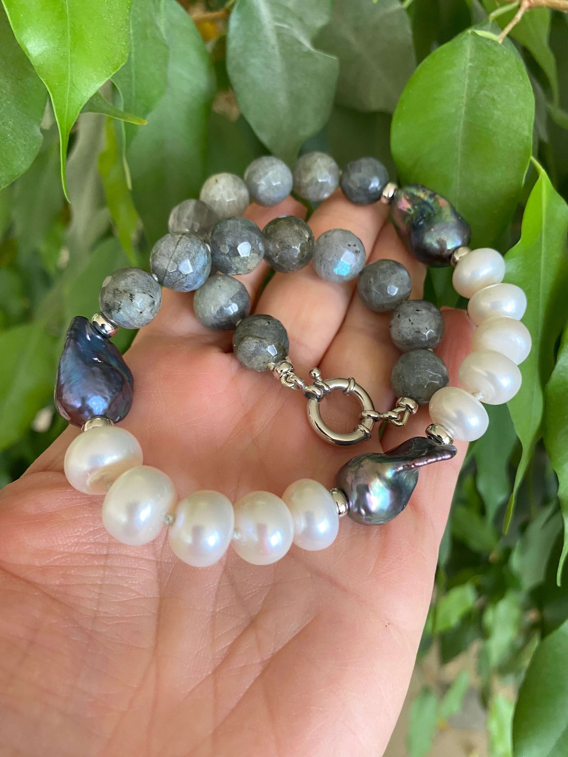 Labradorite pearl necklace featuring baroque and coin pearls, showcasing blue and green gemstone accents.