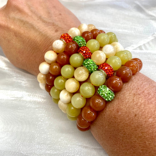 delightful combination of gemstones in Halloween-themed colors. Red Aventurine, Honey Jade, and Olive Jade