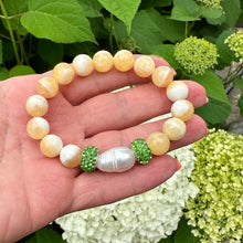 Load image into Gallery viewer, Honey Jade Stretch Bracelet with large freshwater pearl and Green Rhinestones Pave Beads in Middle
