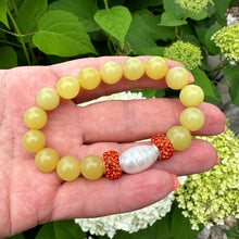 Load image into Gallery viewer, Olive Green Stretch Bracelet with large freshwater pearl andOrange Rhinestones Pave Beads in Middle
