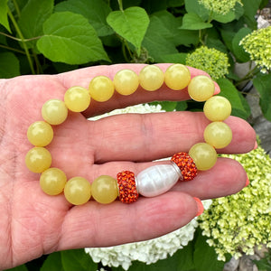 Olive Green Stretch Bracelet with large freshwater pearl andOrange Rhinestones Pave Beads in Middle