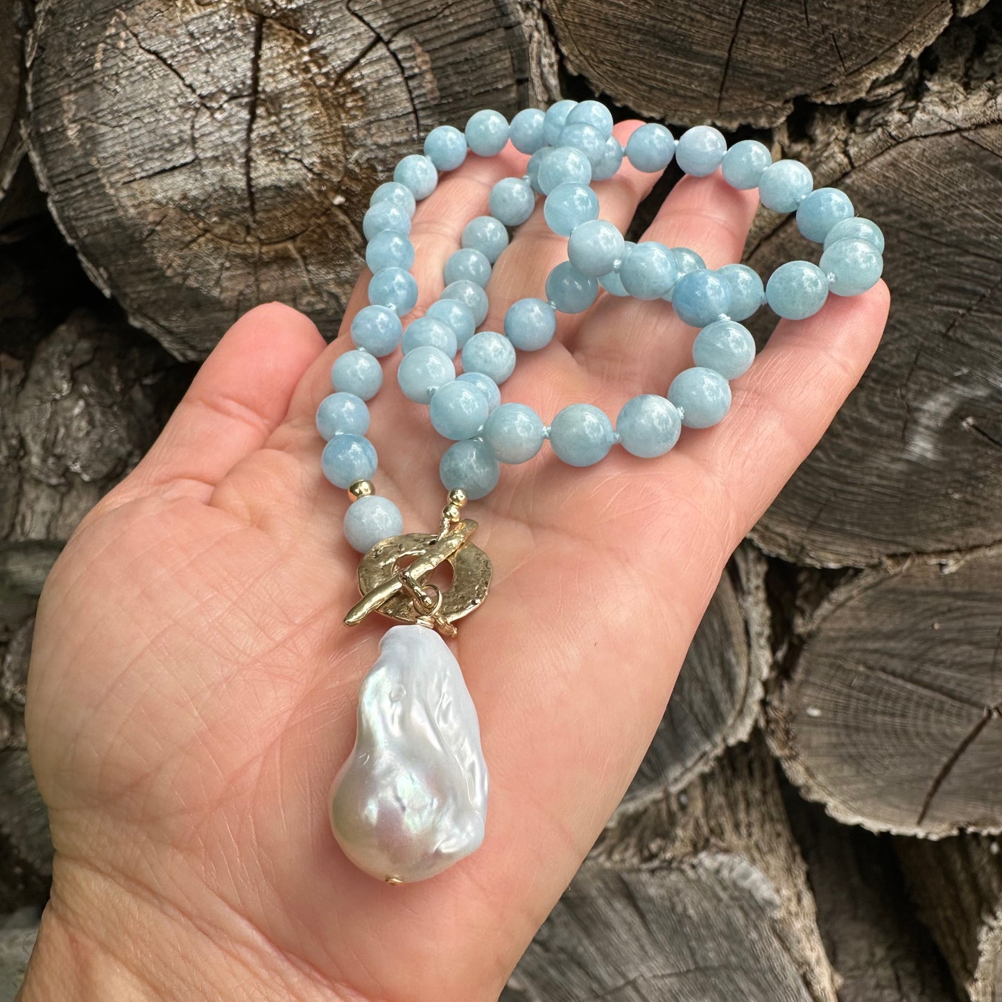 Aquamarine pearl necklace featuring aquamarine beads baroque pearl pendant and artisan gold bronze accents