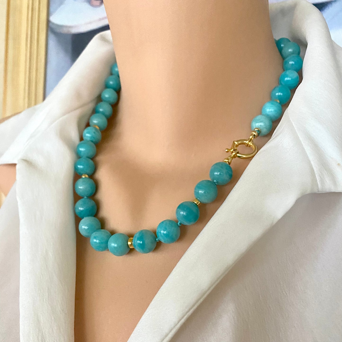 Blue amazonite beaded necklace worn on mannequin, side close-up