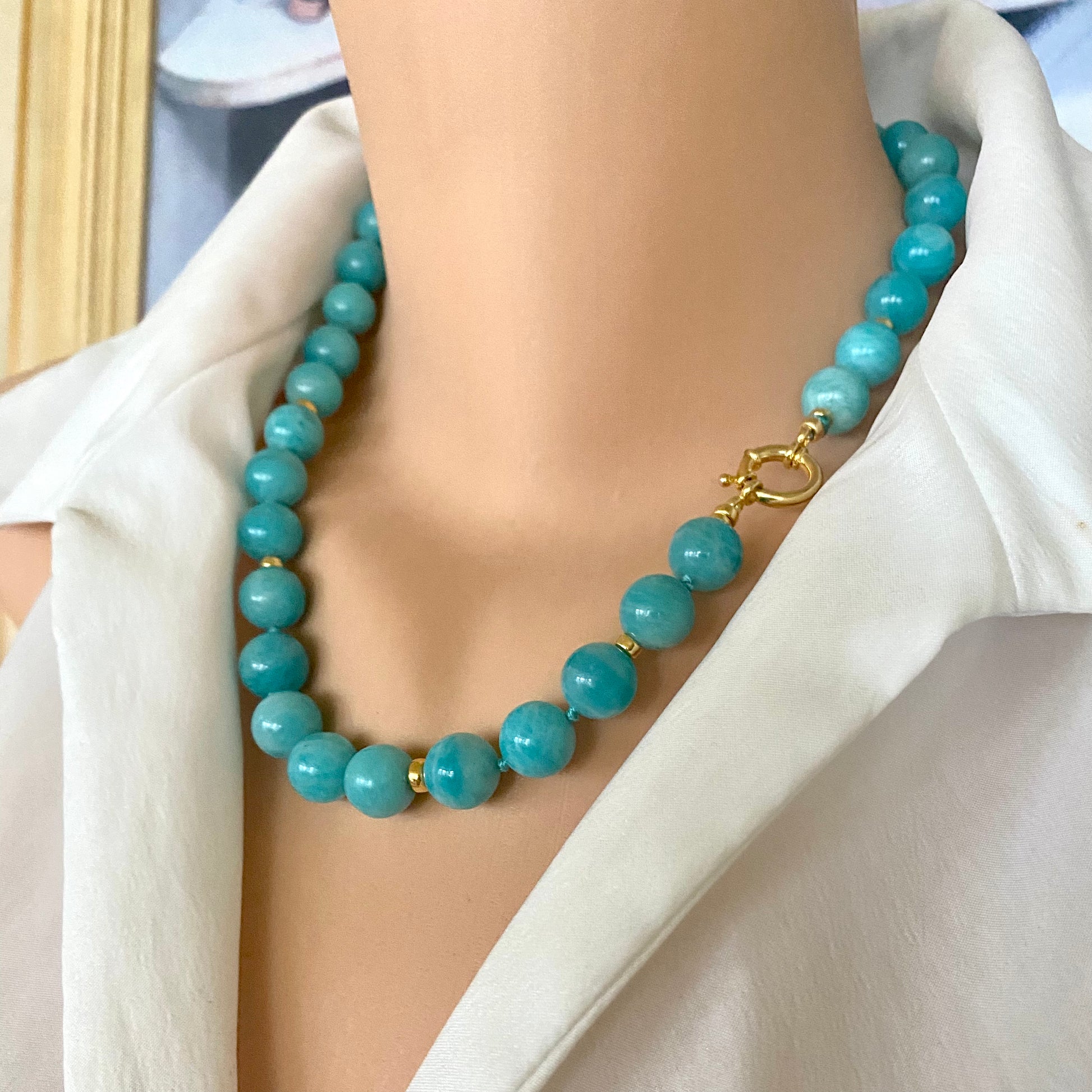 Blue amazonite beaded necklace worn on mannequin, side close-up