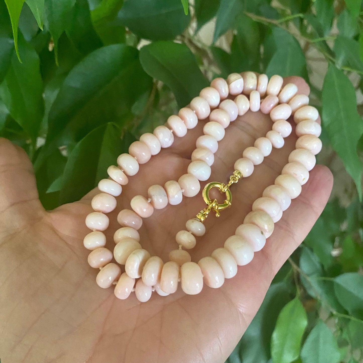 Graduated Pink Opal Necklace Gold in hand, graduated pink opal rondelle candy strand with vermeil clasp