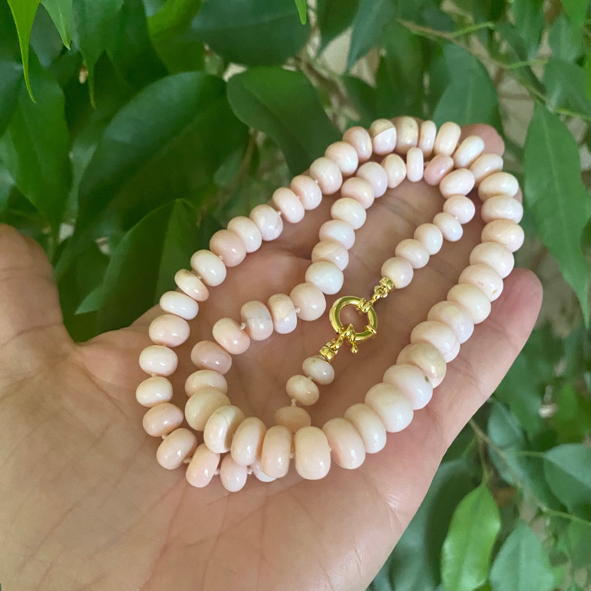 Graduated Pink Opal Necklace Gold in hand, graduated pink opal rondelle candy strand with vermeil clasp
