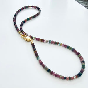 Mixed faceted tourmaline beaded necklace featuring a variety of watermelon multi-color tourmaline beads, accented with gold vermeil plated silver. The necklace is 19 inches long and showcases the vibrant colors associated with the October birthstone.