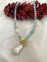 Load image into Gallery viewer, Shaded Blue Aquamarine Beads 6mm &amp; Pearl Toggle Necklace featuring a stunning Baroque Pearl Pendant. Gold Vermeil Plated Silver Details. A perfect gift for March birthdays or any special occasion, measures 17.5-18 inches
