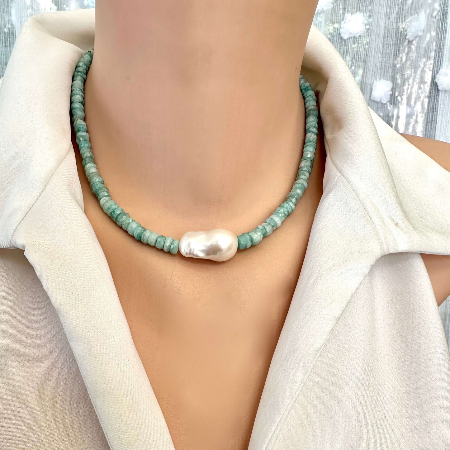 Amazonite and white baroque pearl necklace displayed on mannequin highlighting faceted amazonite beads