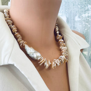 Freshwater Keshi Pearl Necklace in Peach Color, petal pearls drilled in the center, with White Large Baroque Pearl on the side. Secured with a Sterling Silver marine clasp and measures 18" Inches, approximately 46cm
