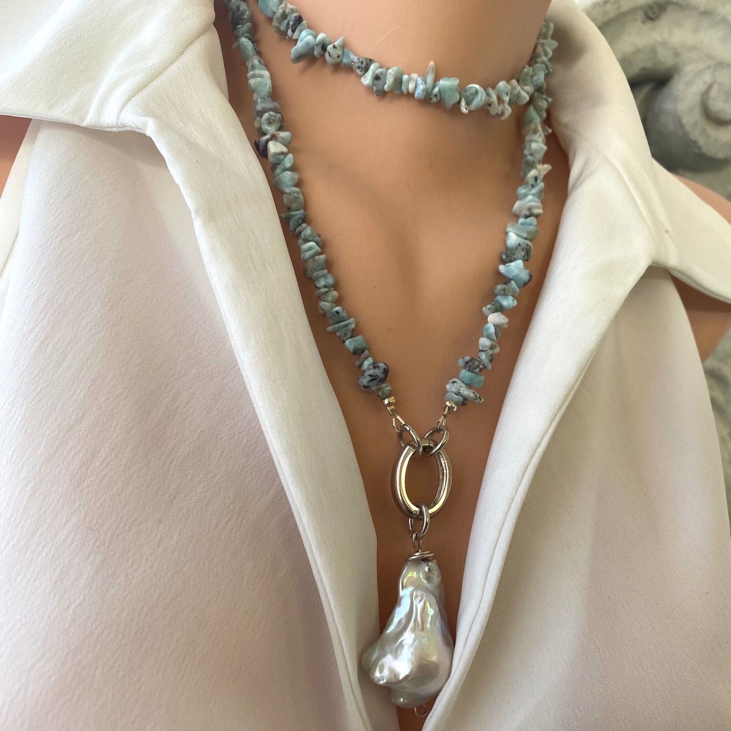 Larimar necklace with pearl pendant worn on model, long larimar strand with extra large baroque pearl