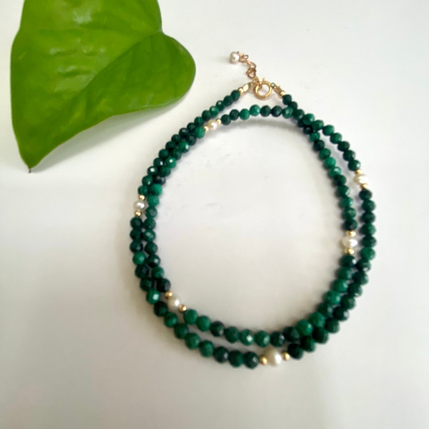 Malachite Pearl Choker Necklace showcasing green malachite beads and freshwater pearls against a white background.