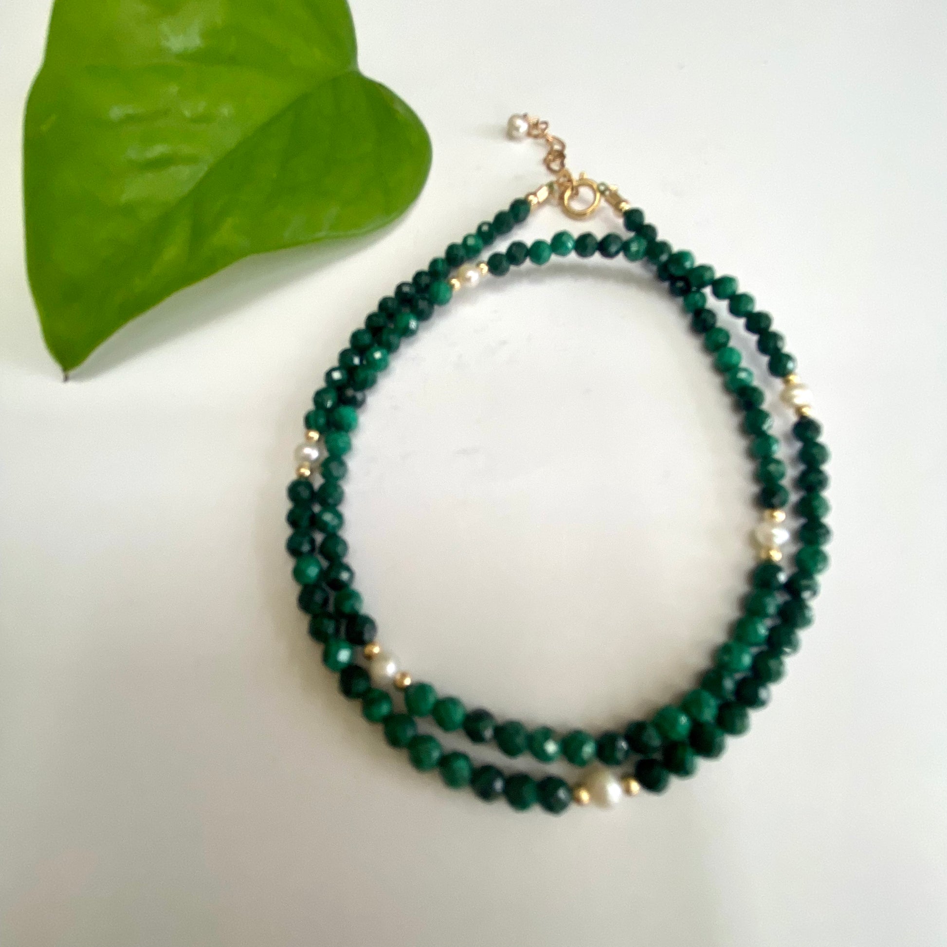 Malachite Pearl Choker Necklace showcasing green malachite beads and freshwater pearls against a white background.