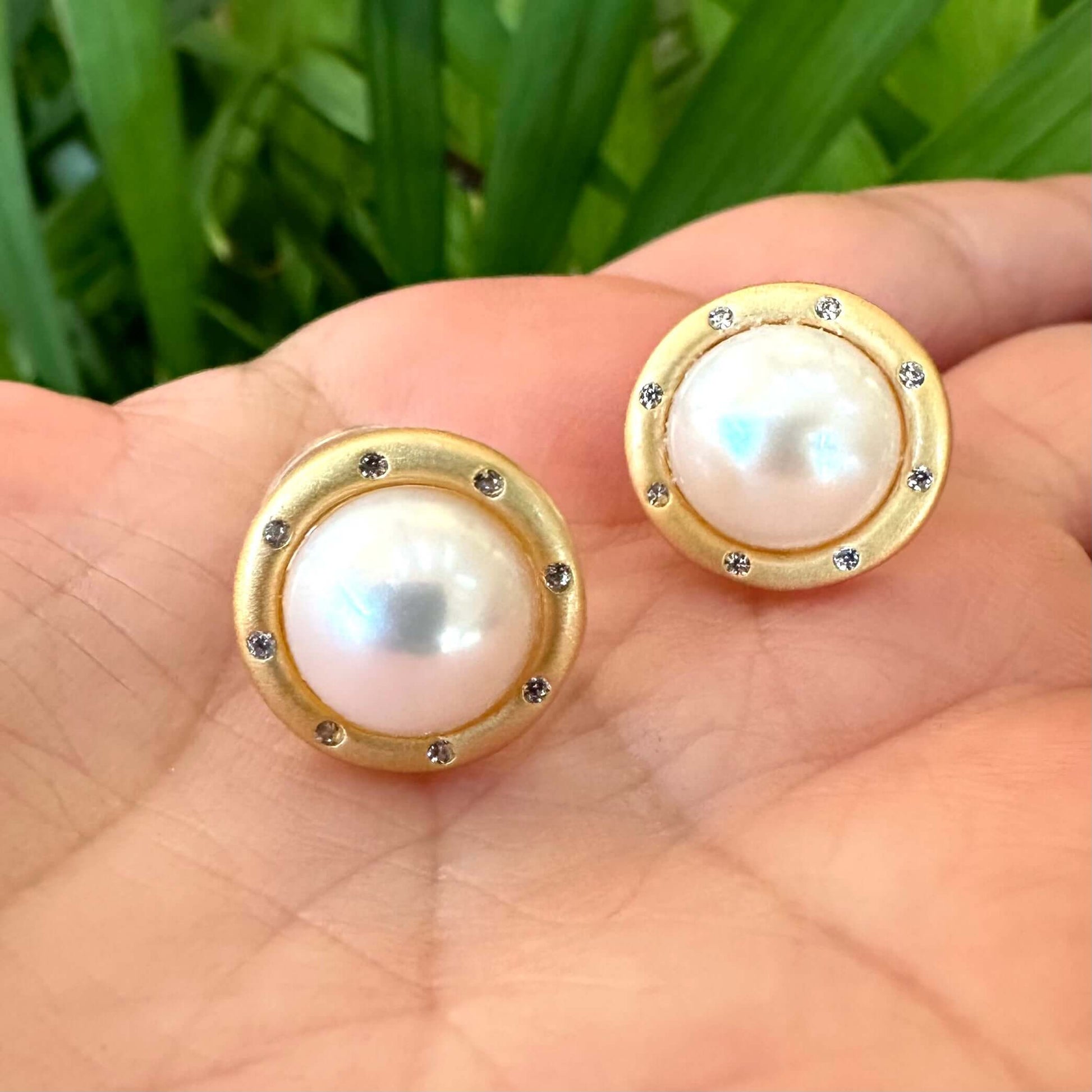 White Edison Mabe Pearl stud earrings with CZ accents in gold vermeil-plated silver, ideal for bridal jewelry and special occasions.