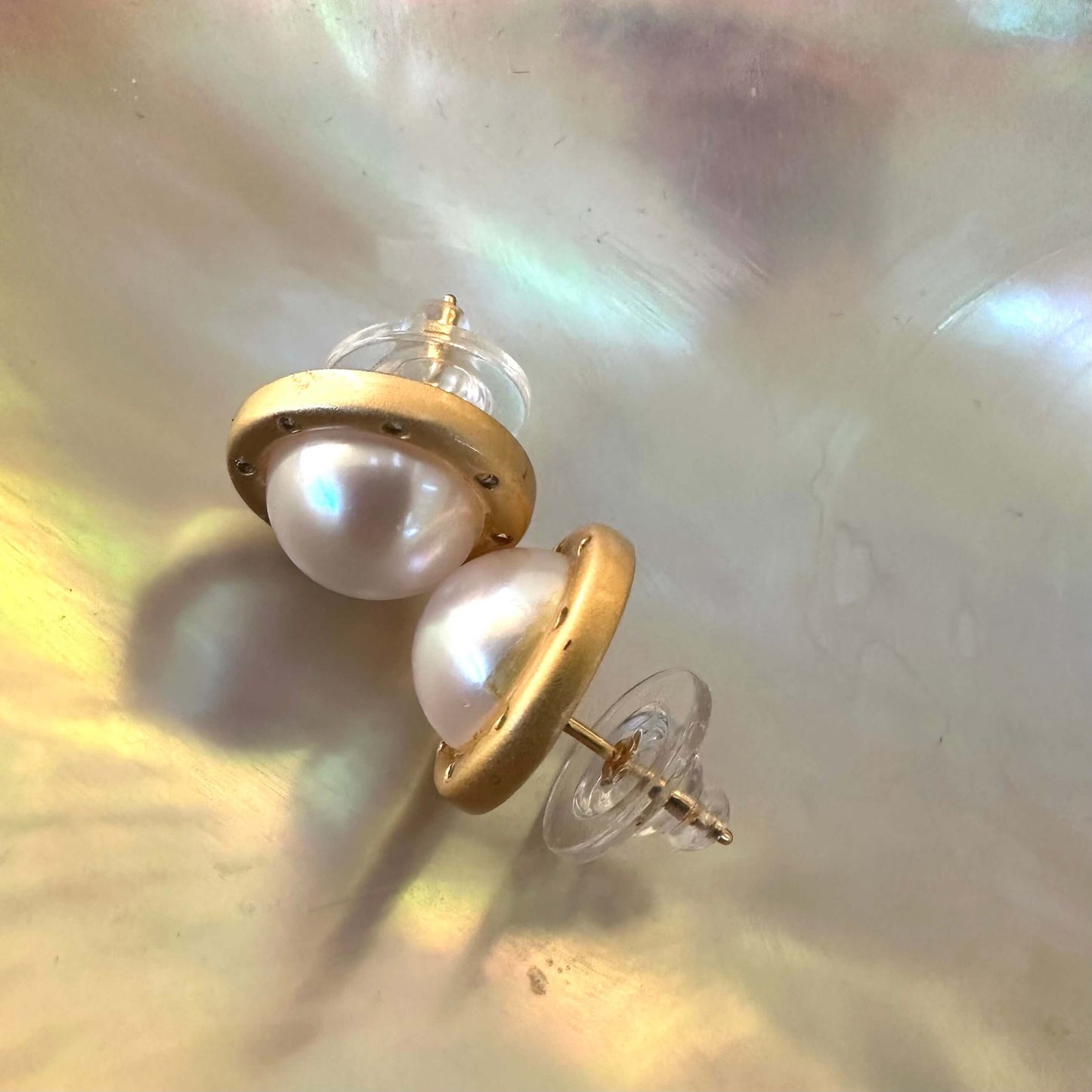 White Edison Mabe Pearl stud earrings with CZ accents in gold vermeil-plated silver, ideal for bridal jewelry and special occasions.