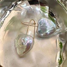 Load image into Gallery viewer, Heart-shaped freshwater pearl drop earrings, featuring 20mm pearls on gold vermeil-plated silver earring wires, perfect for bridal or romantic occasions.
