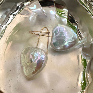 Heart-shaped freshwater pearl drop earrings, featuring 20mm pearls on gold vermeil-plated silver earring wires, perfect for bridal or romantic occasions.