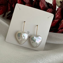 Load image into Gallery viewer, Heart-shaped freshwater pearl drop earrings, featuring 20mm pearls on gold vermeil-plated silver earring wires, perfect for bridal or romantic occasions.
