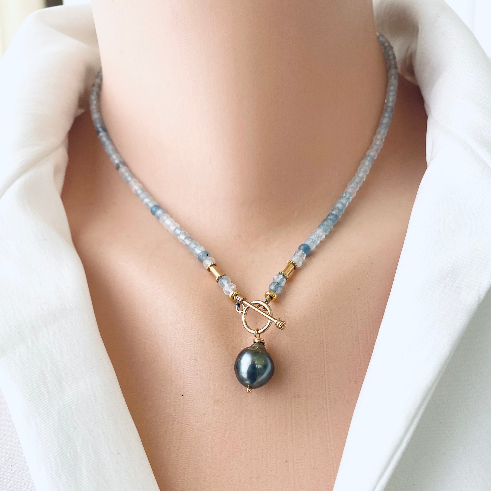Aquamarine pearl pendant necklace with Tahitian baroque pearl worn on mannequin