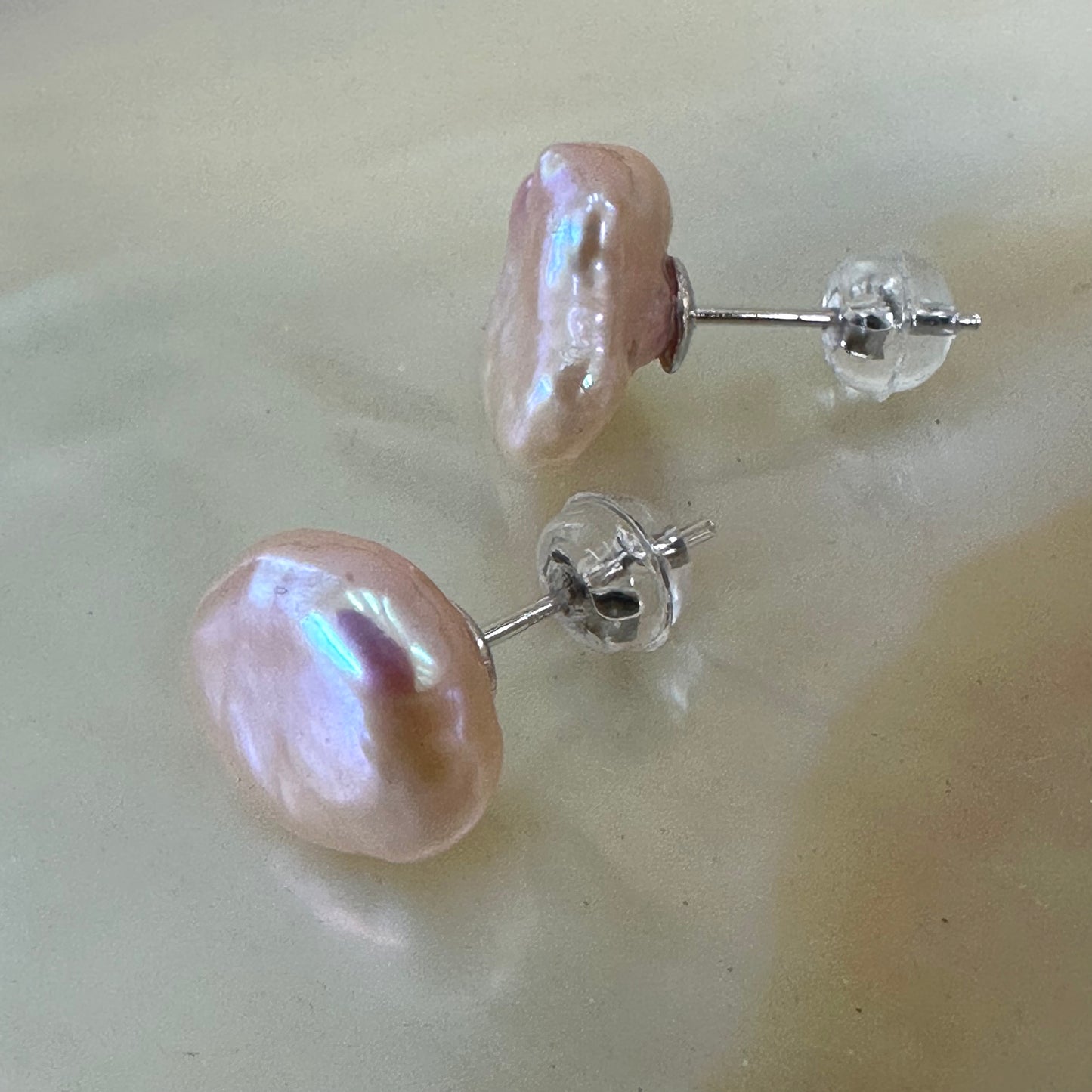 Pink Keshi Pearl Stud Earrings in Sterling Silver showcasing luminous Sakura-pink keshi pearls that radiate elegance.
