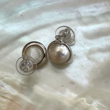 Load image into Gallery viewer, White Mabe Edison pearl stud earrings with CZ accents, set in sterling silver, minimalist and elegant, perfect for bridal jewelry or a special gift.
