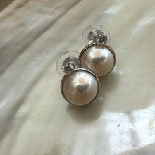 Load image into Gallery viewer, White Mabe Edison pearl stud earrings with CZ accents, set in sterling silver, minimalist and elegant, perfect for bridal jewelry or a special gift.

