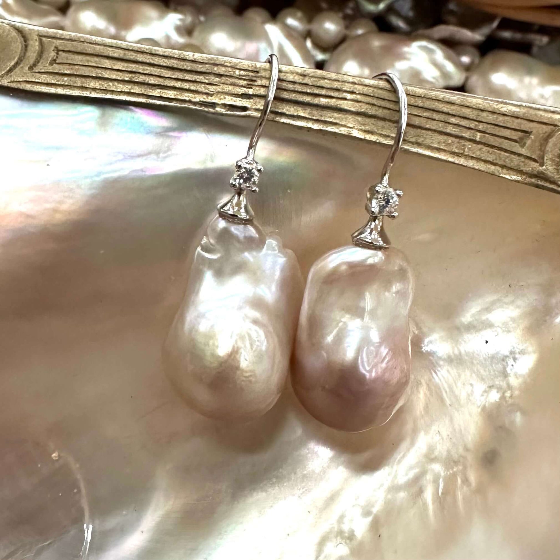 Lavender Baroque Pearl Earrings – silver pair with soft lavender-white glow on shell