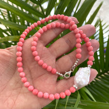 Lade das Bild in den Galerie-Viewer, Pink coral and one large baroque pearl on the side of the necklace with sterling silver details, measuring 18.5 inches. This vibrant summer jewelry piece is perfect for beach outings and makes a thoughtful gift for her.
