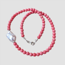 Lade das Bild in den Galerie-Viewer, Pink coral and one large baroque pearl on the side of the necklace with sterling silver details, measuring 18.5 inches. This vibrant summer jewelry piece is perfect for beach outings and makes a thoughtful gift for her.
