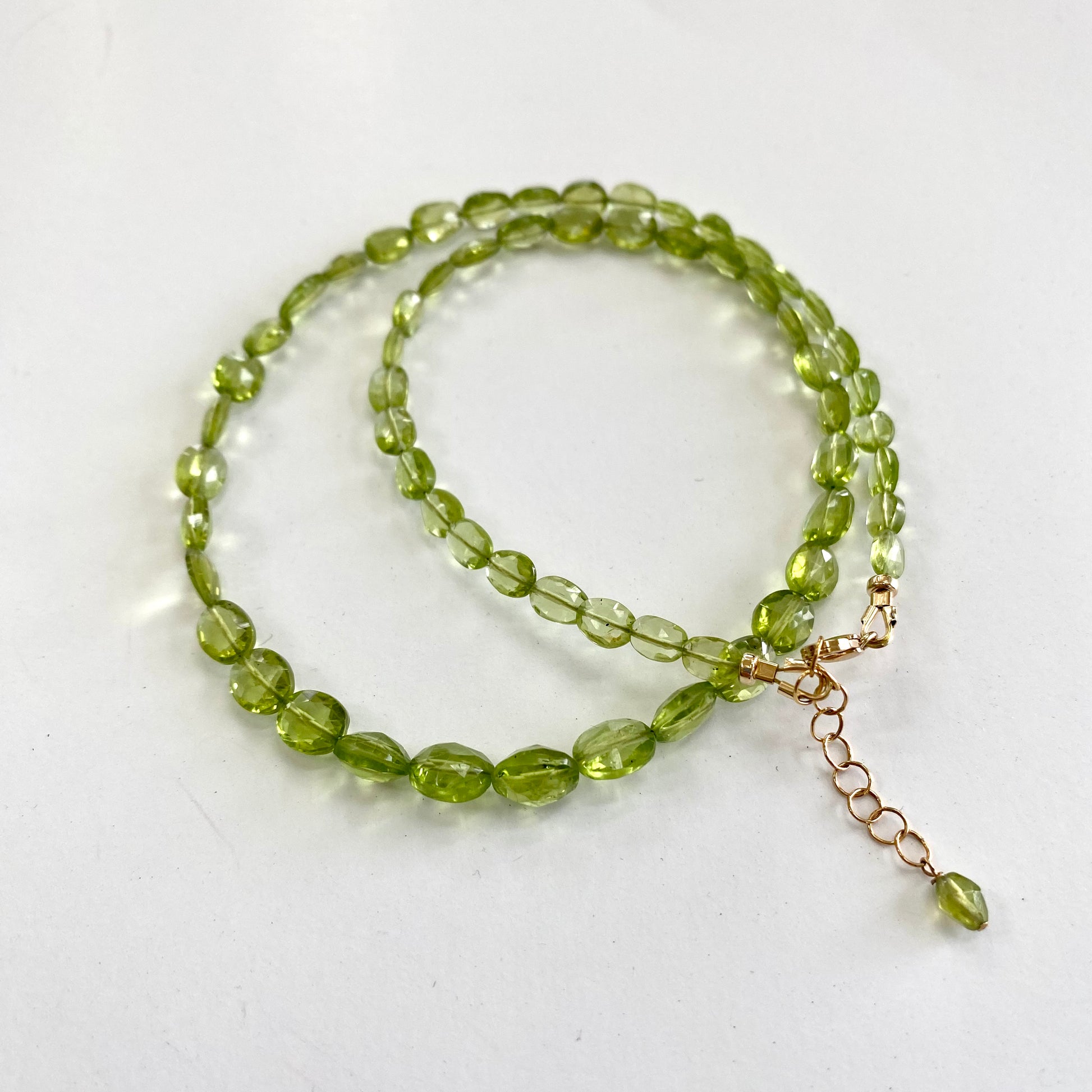 Peridot necklace 14K gold filled featuring delicate green peridot beads, handmade in Canada, showcasing spring-inspired elegance.