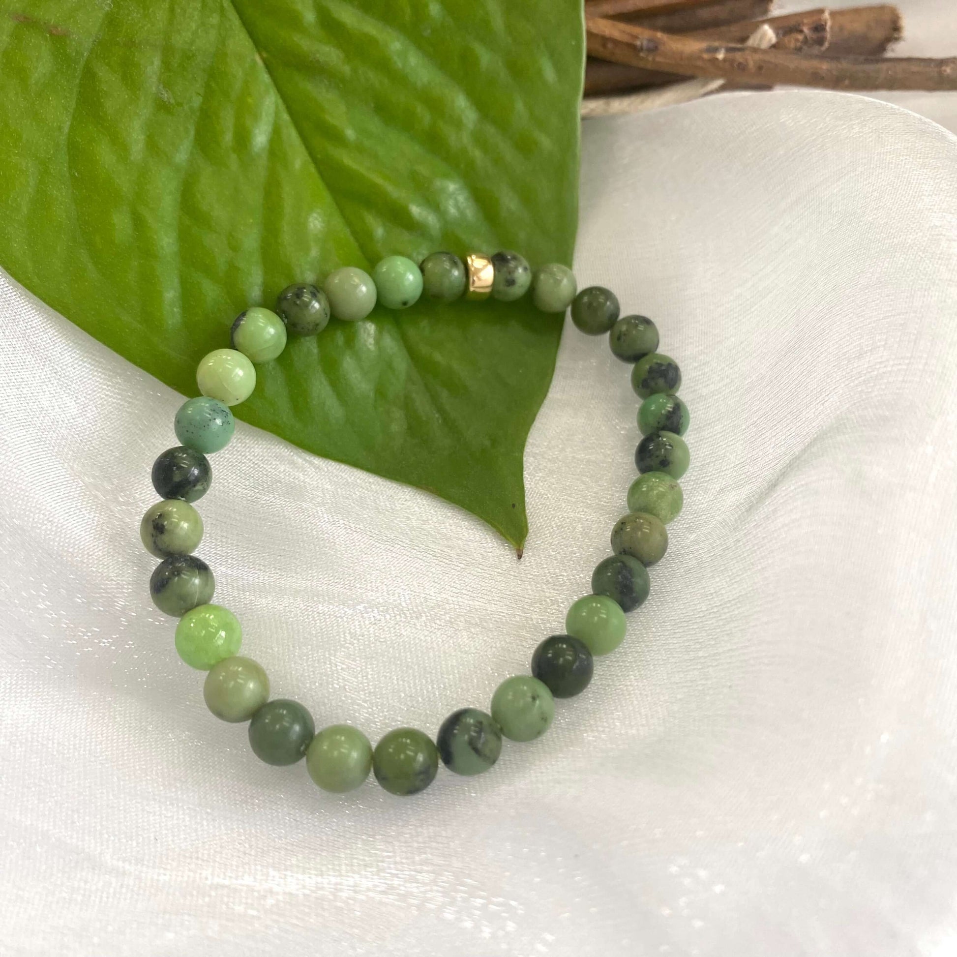 Chrysoprase Stretch Bracelet – 6mm beads with 14K Gold Filled accents, showcasing vibrant green tones.