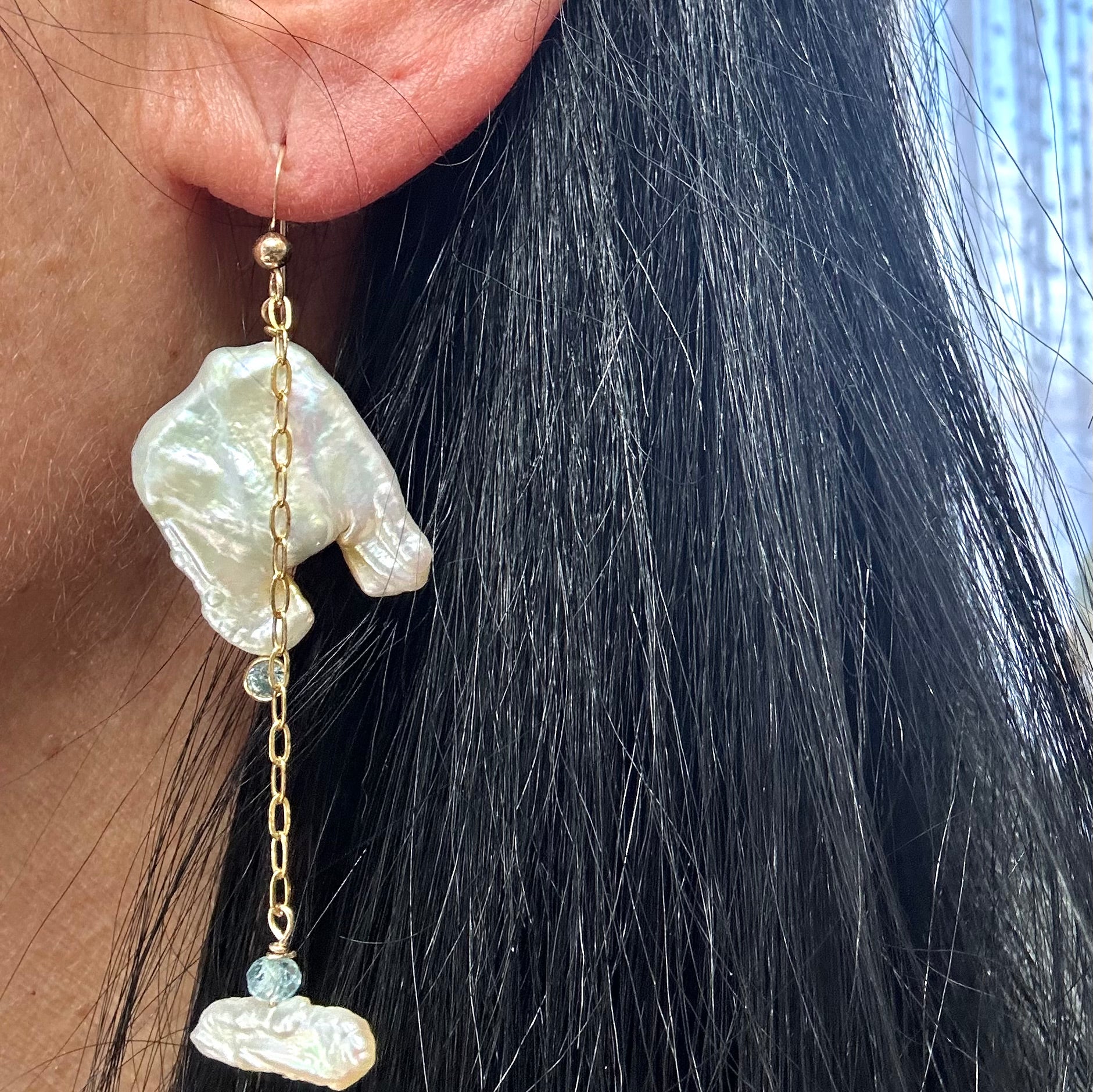 Boho pearl earrings gold filled worn on woman’s ear — elegant handcrafted square pearl and blue gemstone jewelry by Loulia Pearl Jewelry