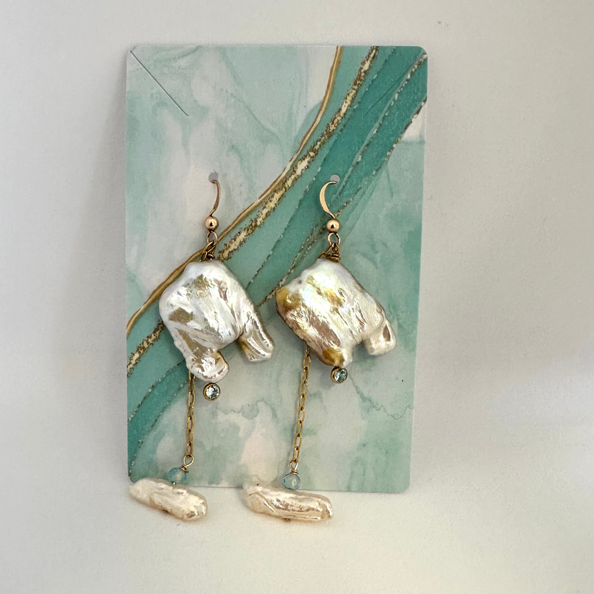 Boho pearl earrings gold filled against azure background — handcrafted square pearl and blue topaz earrings by Loulia Pearl Jewelry
