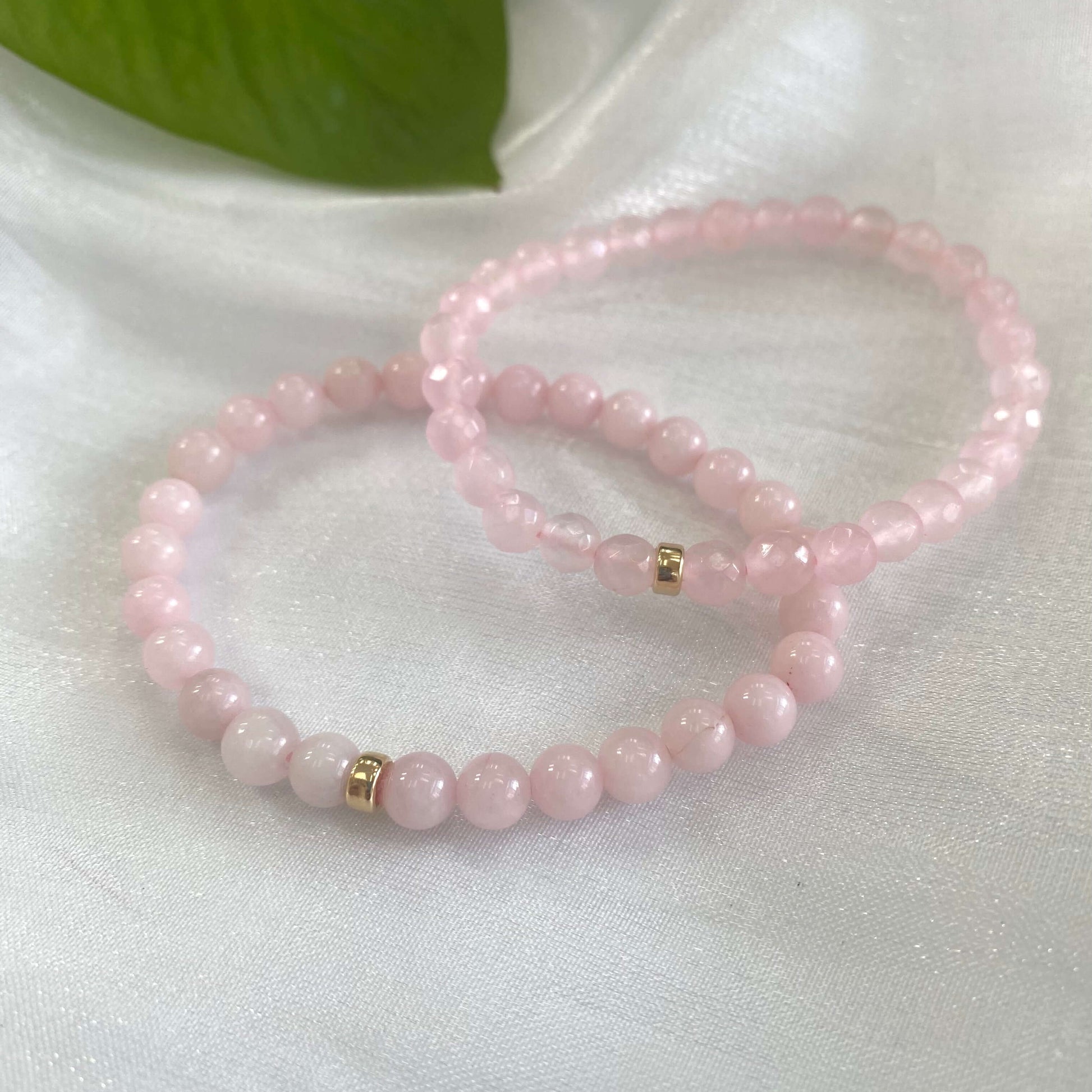Rose quartz stretch bracelet featuring 6mm beads and 14K gold filled accents, perfect for layering or solo wear.