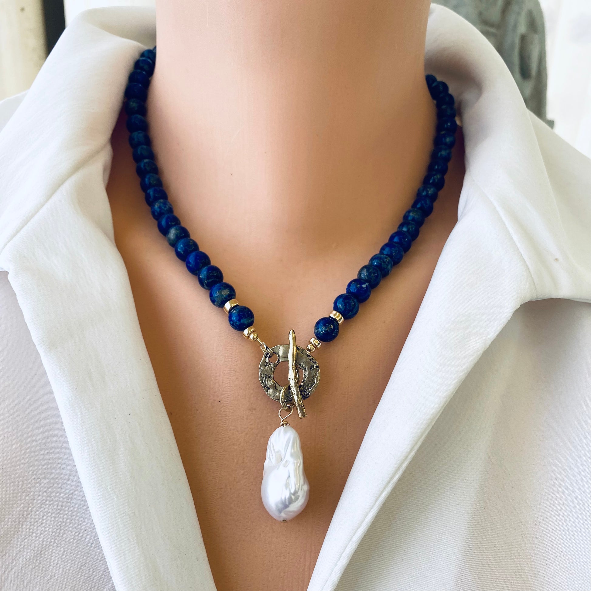 Lapis lazuli baroque pearl necklace featuring natural stone beads and freshwater pearl pendant