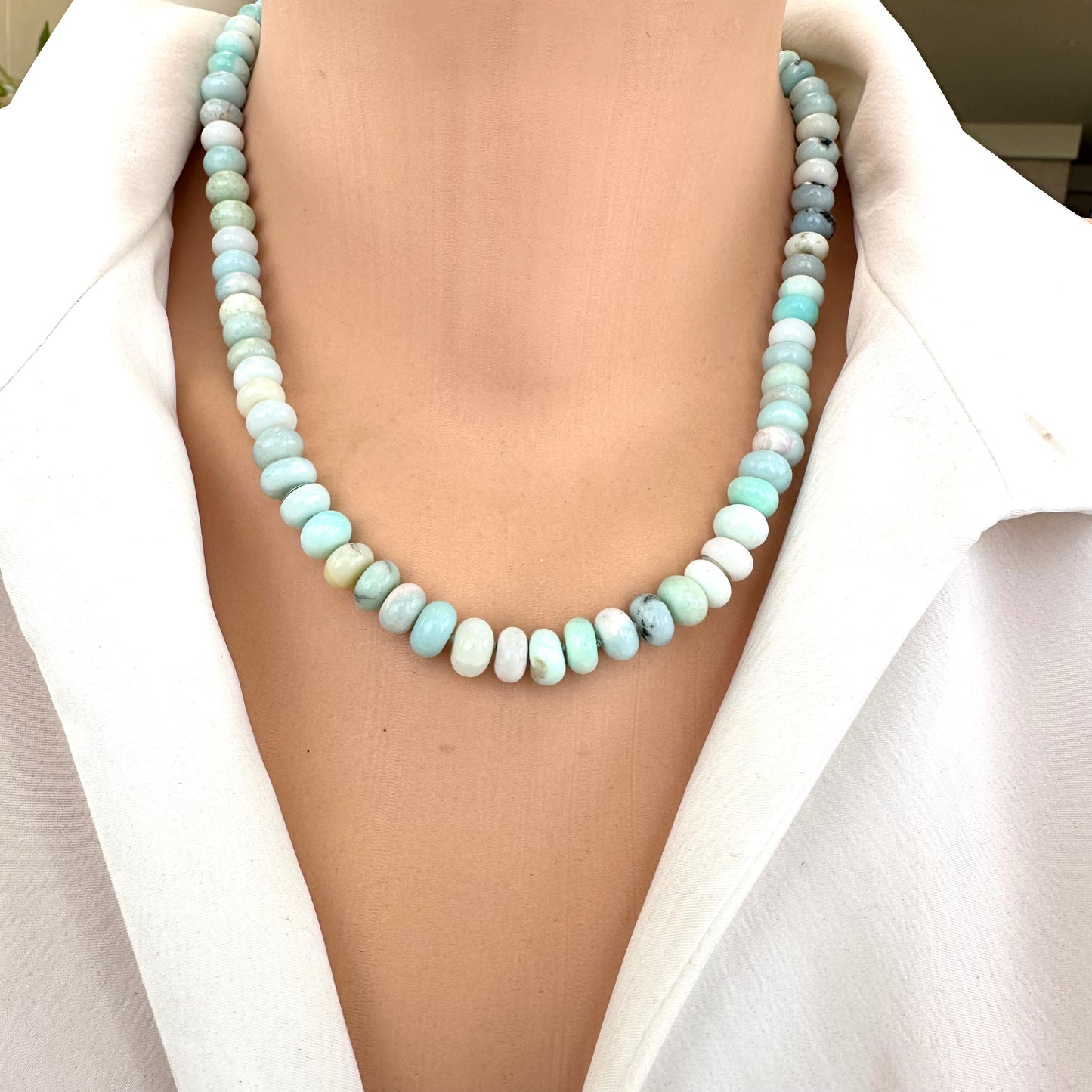 Blue Peru Opal Necklace Gold close-up at neckline, natural blue Peru opal bead strand