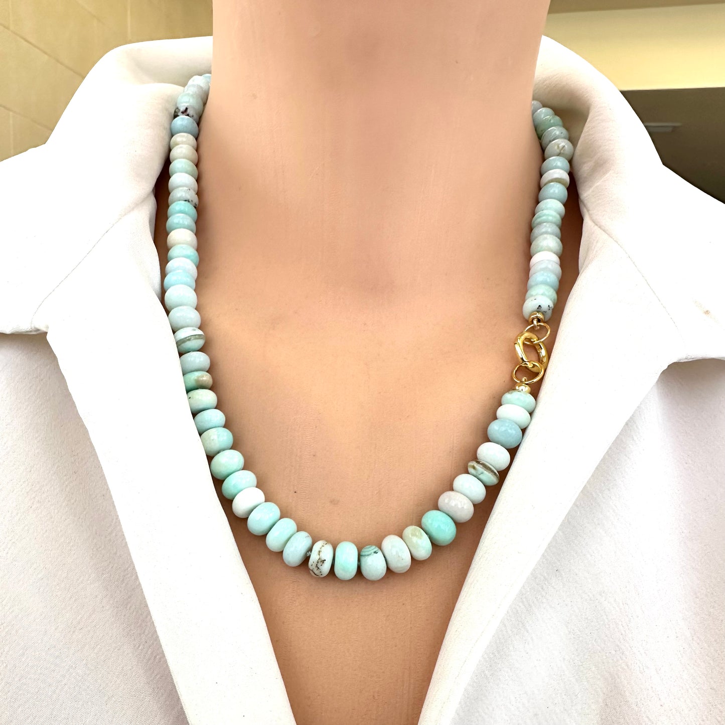 Blue Peru Opal Necklace Gold on model, single strand opal rondelles with gold vermeil clasp