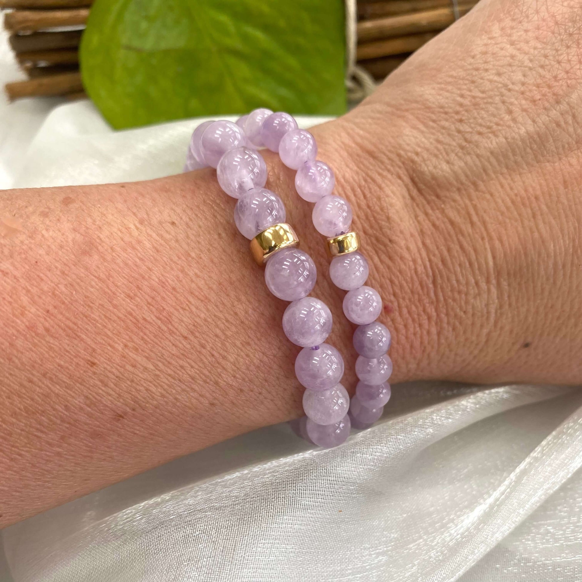 Lavender Amethyst Bracelet stacked pair worn on model’s wrist – lifestyle shot
