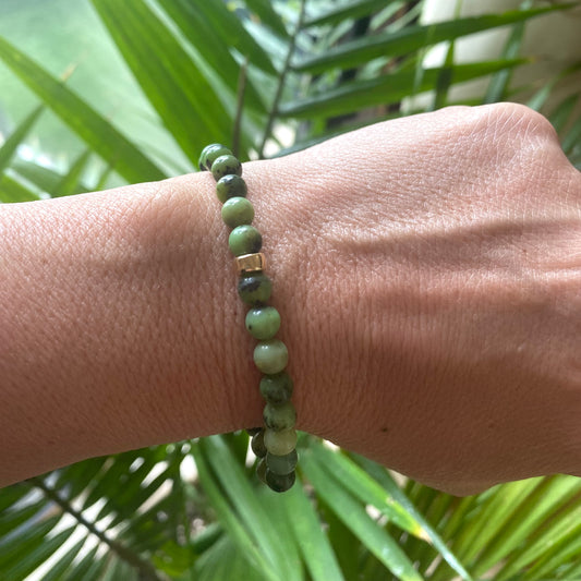Chrysoprase Stretch Bracelet – 6mm Beads in 14K Gold Filled worn on wrist with green tones and natural design