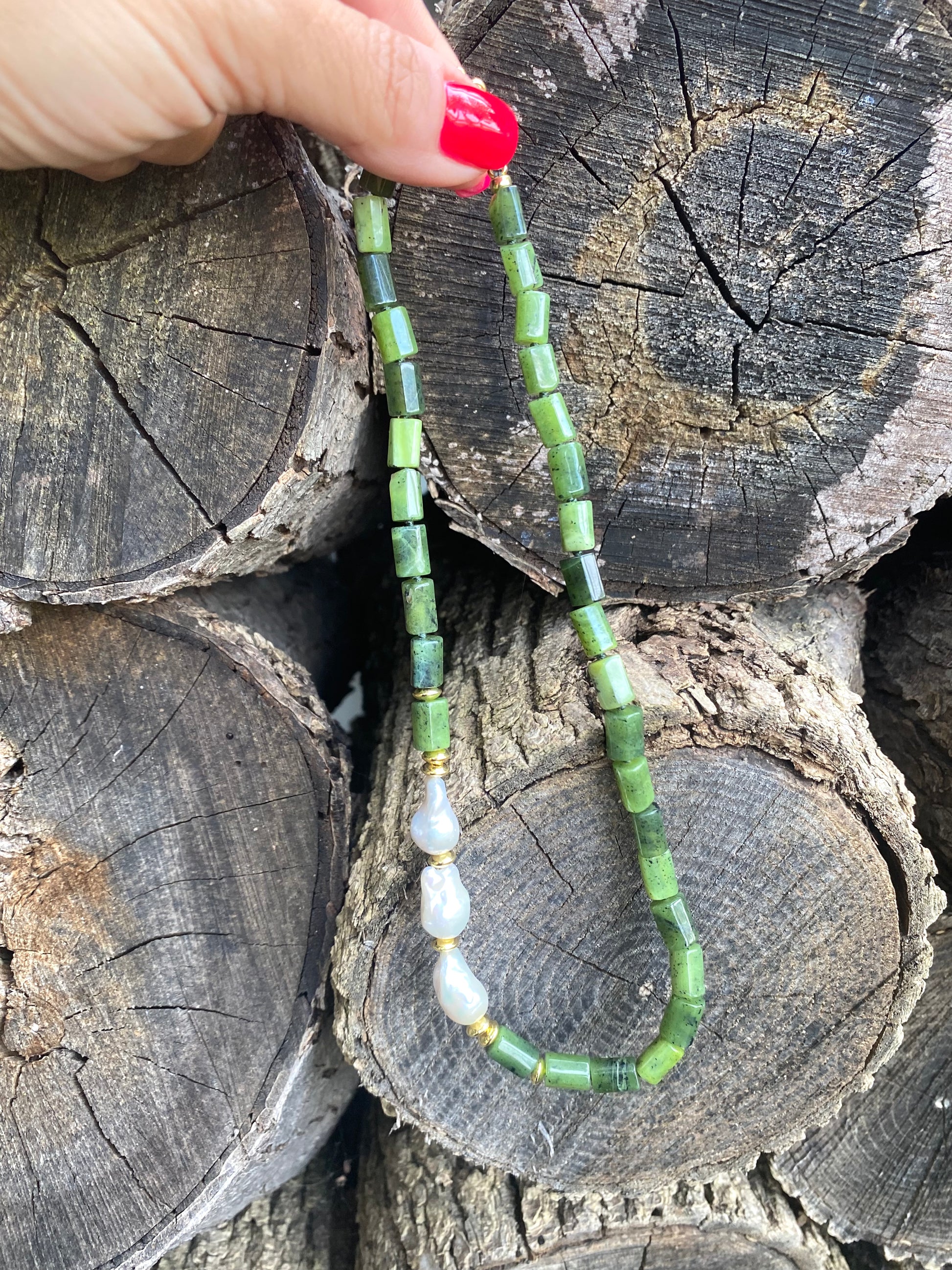 Canadian jade pearl necklace displayed vertically highlighting jade tube bead design