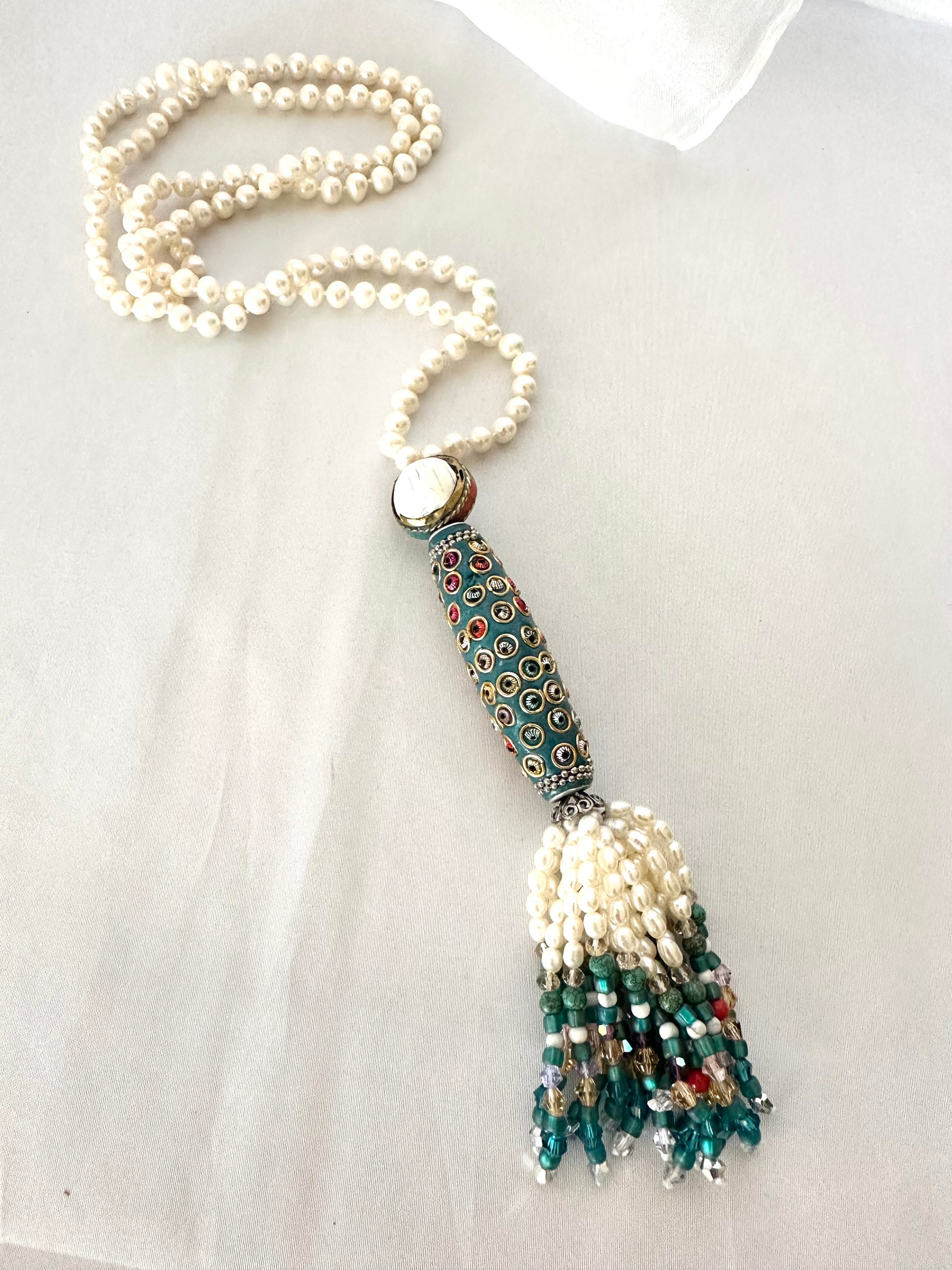 Bohemian Pearl Tassel Necklace featuring freshwater pearls, colorful beads, and a handcrafted design.