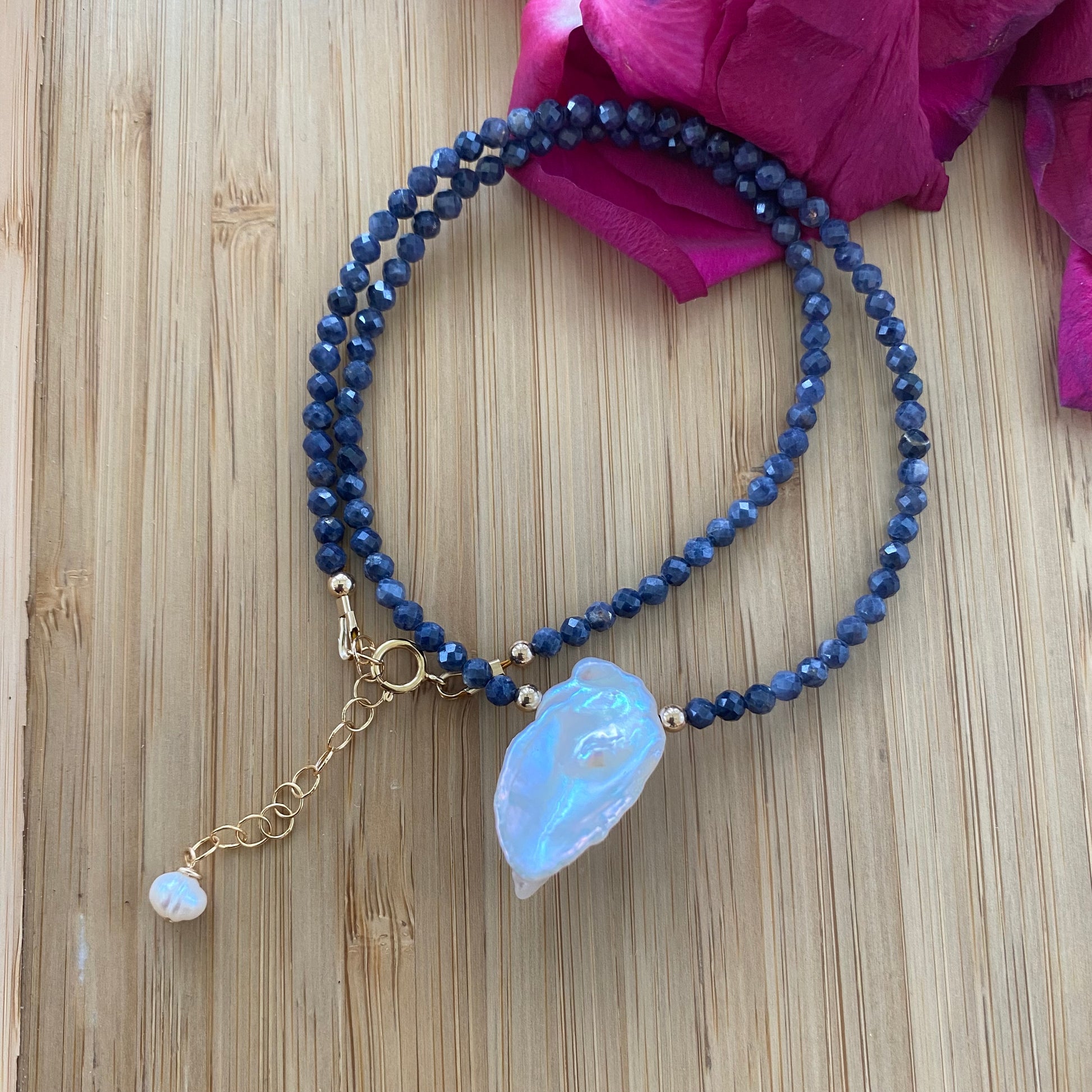 Sapphire keshi pearl choker necklace with faceted blue sapphire beads and adjustable extender