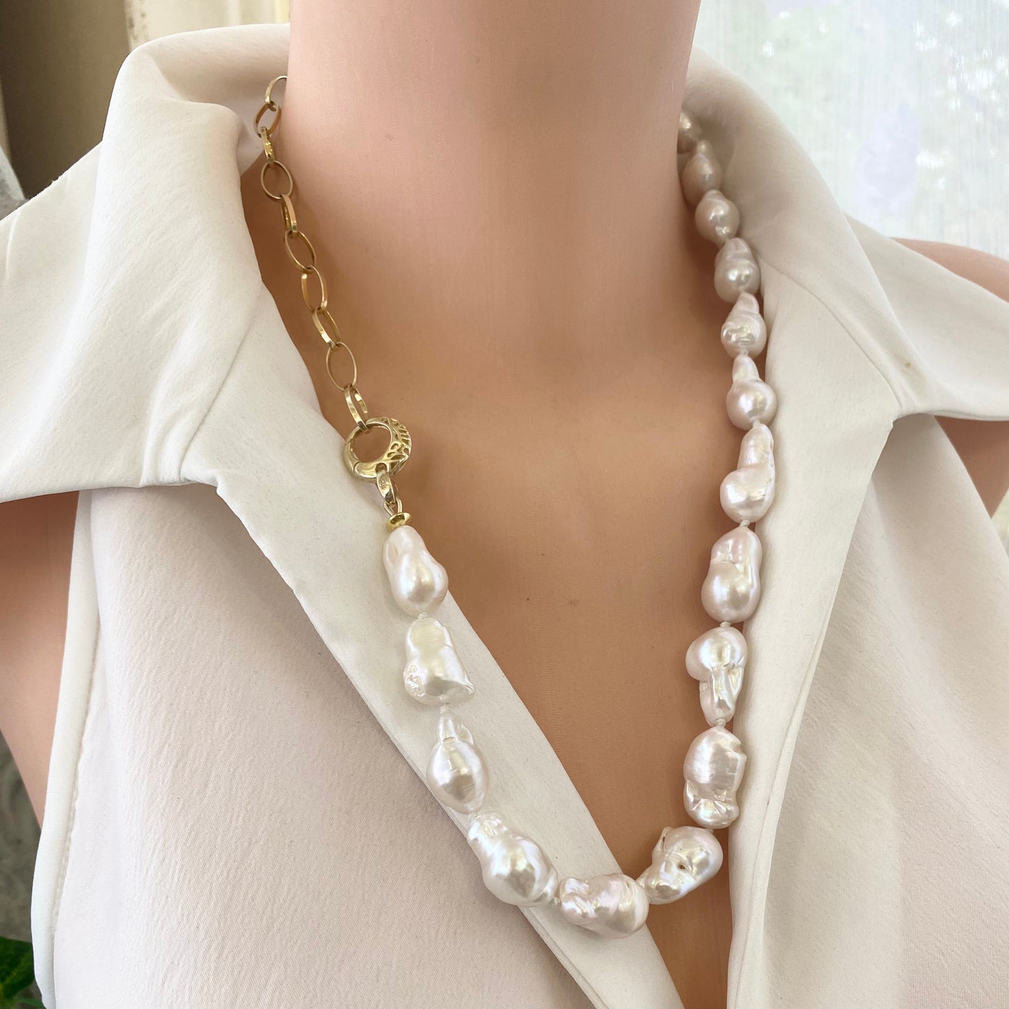 White baroque pearl and gold chain necklace displayed on mannequin, chunky gold vermeil chain handmade in Canada.